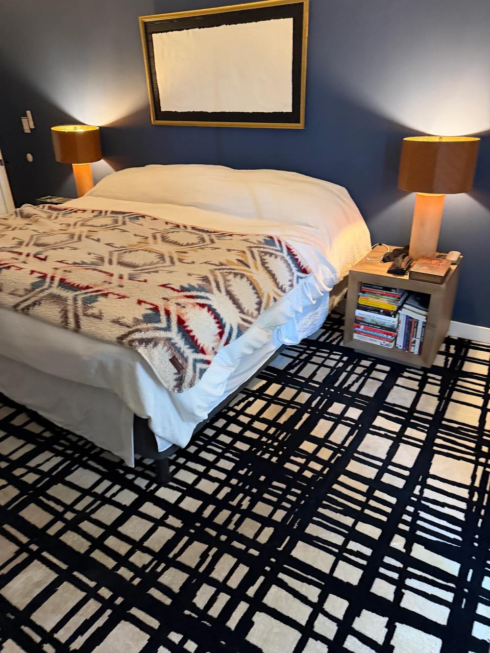 The original black-and-white L.A. piece rug in the bedroom